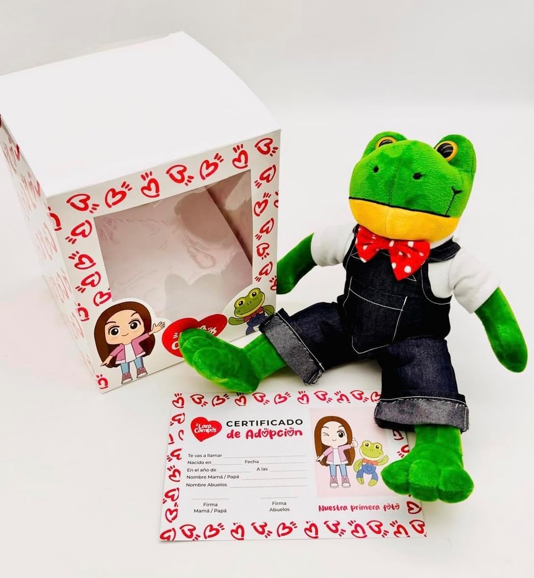 Genérico Peluche de Rana Verde Rhenne, con Overol de Mezclilla y Moño Rojo, Incluye Caja Representativa, Certificado de Adopción y Stickers