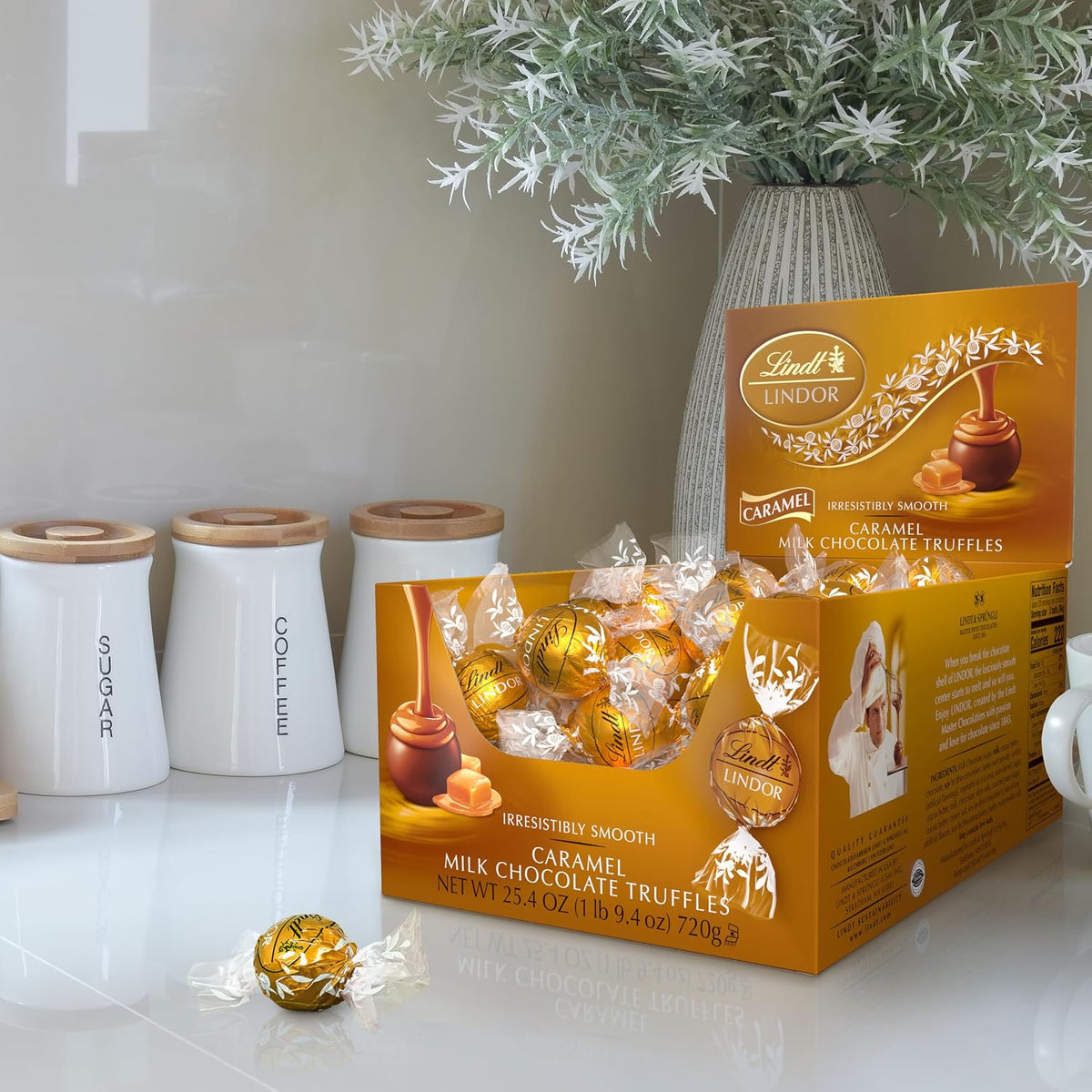 Lindt LINDOR Caramelo trufas de chocolate de leche 60 Cuadro número