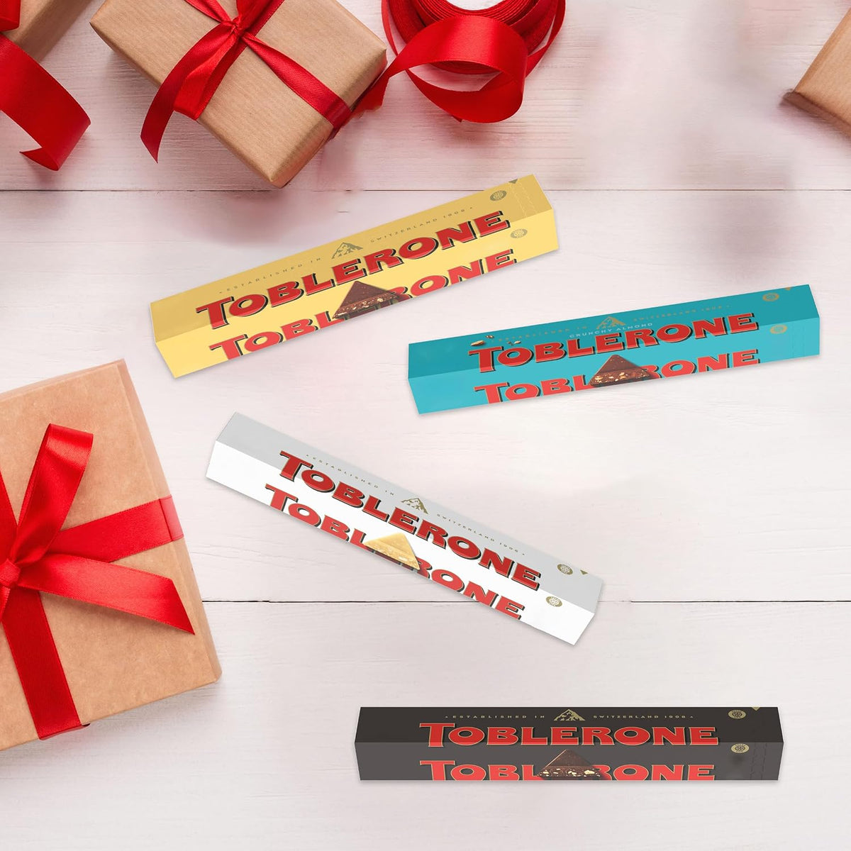 Toblerone Chocolate con Leche Suiza con Almendras Caramelizadas Saladas y Turrón de Miel y 3.52 Oz