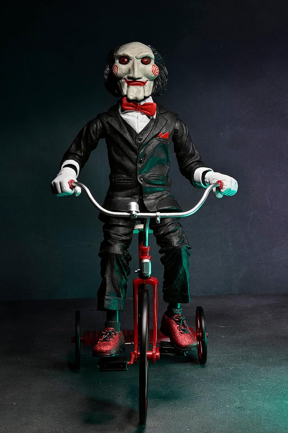 NECA 12" Action Figure con Triciclo Saw